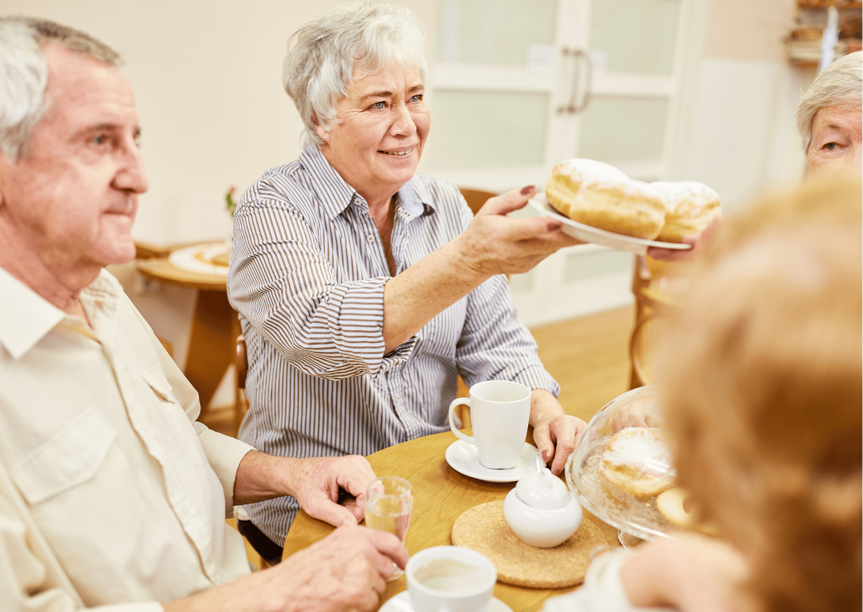 Three people having morning tea