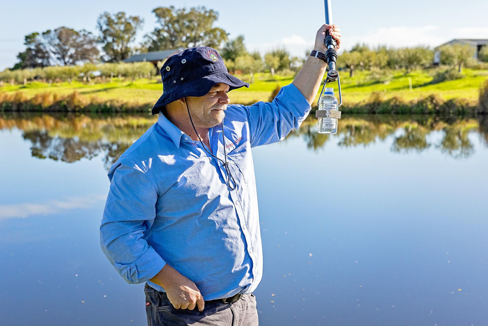 Shire of Capel Staff member testing water sample