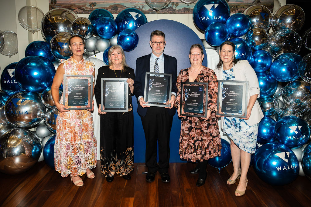 Shire of Capel representatives, standing together, holding framed awards