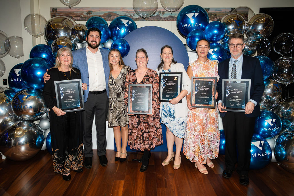 Shire of Capel representatives, standing together, holding framed awards